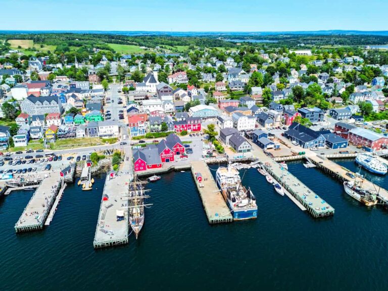 aerial view of lunenberg waterfront, town, and surrounding hills
