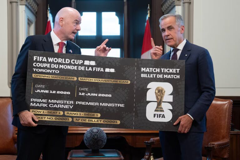 Immigration Minister suspends work-permit requirement for foreign employees at World Cup