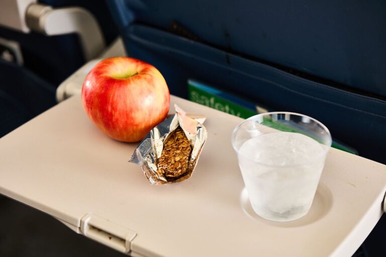Flight Attendant Reveals How Airlines Pick the In-flight Snacks